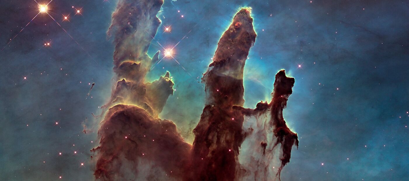 The Pillars of Creation in the Eagle Nebula, imaged by the Hubble Space Telescope
